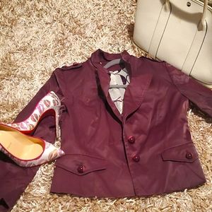 Maroon/burgundy short jacket.